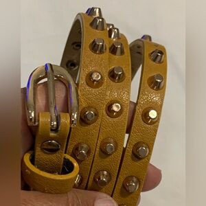 Mustard PreOwned Studded Ladies Belt Size 40” see pictures. Selling as Is.